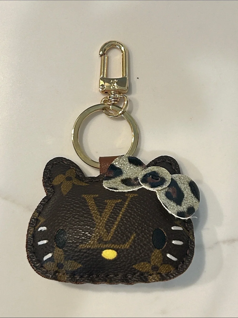 Upcycled LV Gold-Tone Brown Monogram HK Keychain Bag Charm with Leopard Bow